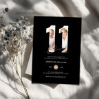 11th birthday invitation card with two photos of a boy on a black background with white text.