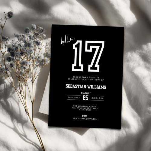 Black 17th birthday invitation card with white text on a light background