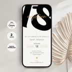 Phone displaying a 18th birthday invitation with 'eighteen' design, surrounded by decorative leaves on a light background.