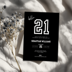 Black 21st birthday invitation card with white text on a light background