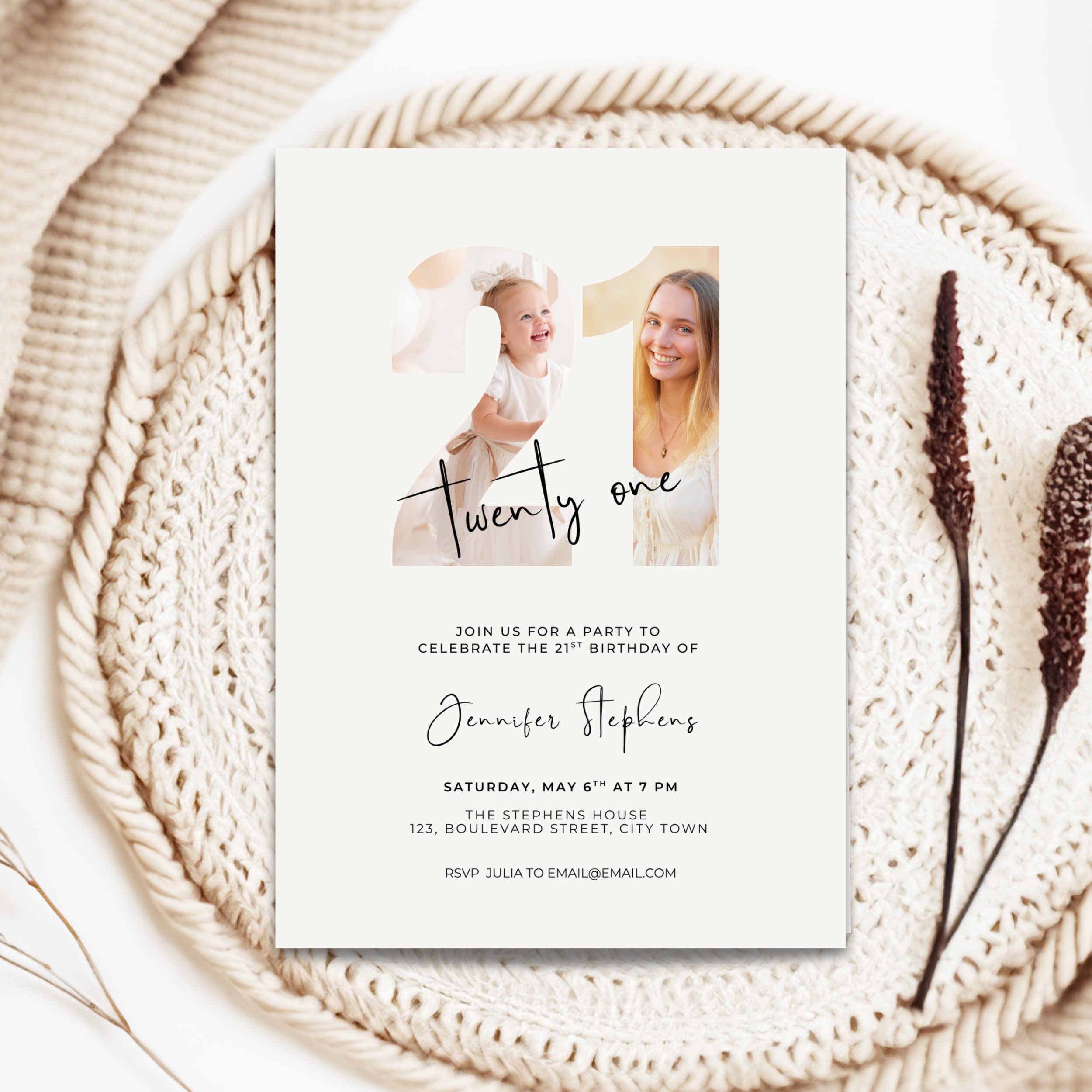 21st birthday invitation card with photos of a baby and a woman, placed on a textured surface.