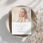 21st birthday invitation card with a photo of a smiling person on a decorative plate with flowers.