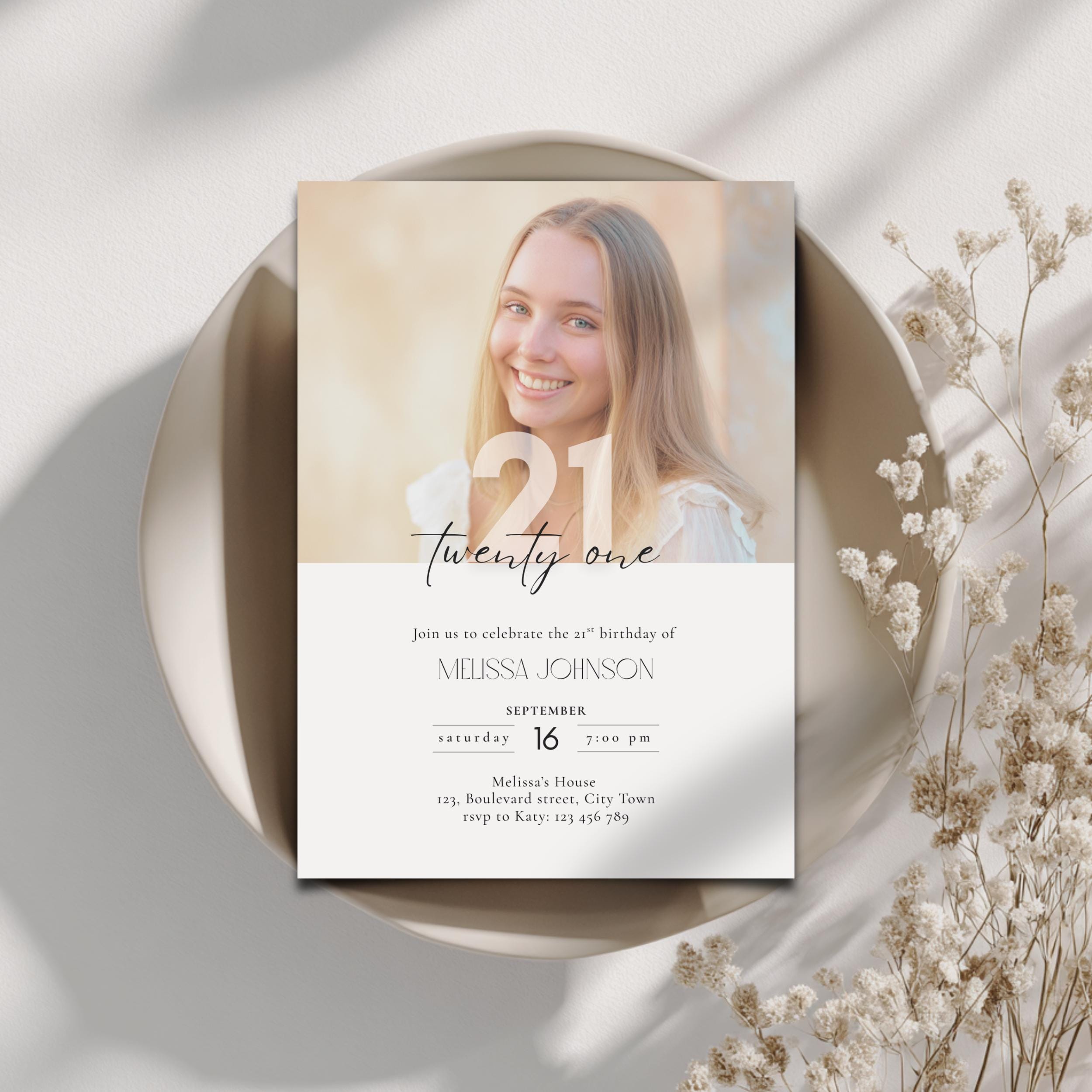 21st birthday invitation card with a photo of a smiling person on a decorative plate with flowers.