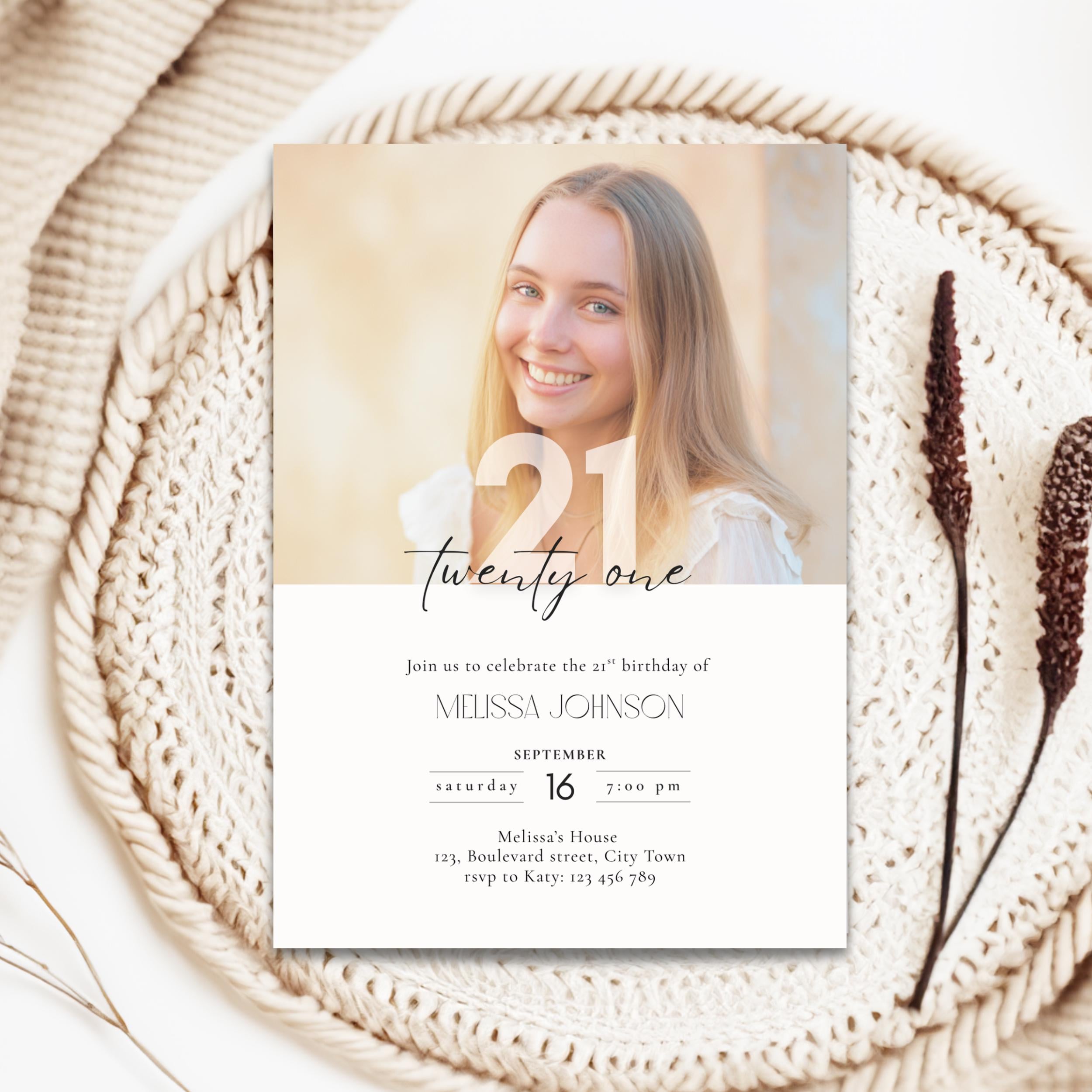 21st birthday invitation card with a photo of a smiling person on a woven surface.