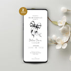 Phone displaying a black bow 30th birthday party invitation with a bow graphic on a light gray background with flowers.