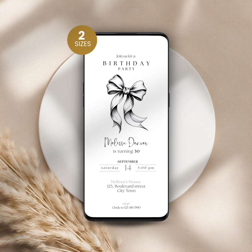 Phone displaying a birthday party invitation with a bow graphic on a beige background