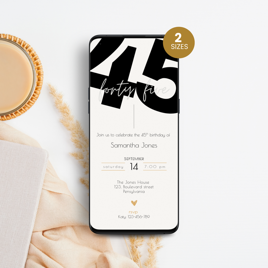 Phone displaying a 45th birthday invitation with a cup of coffee and decorative elements on a white surface.