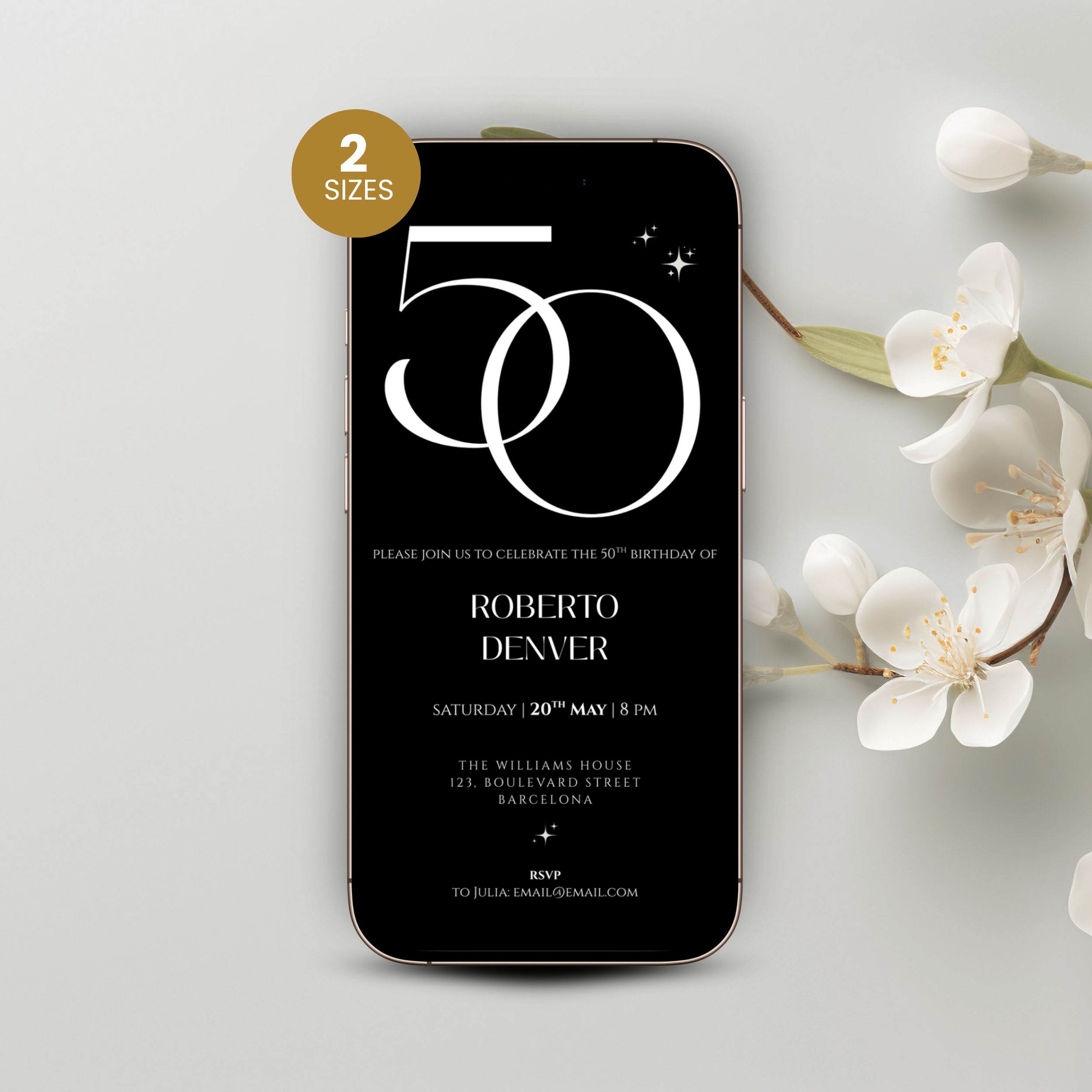 Phone displaying a birthday invitation with '50' design, surrounded by white flowers on a light gray background.