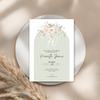 Invitation card for a 70th birthday celebration with floral design on a neutral background