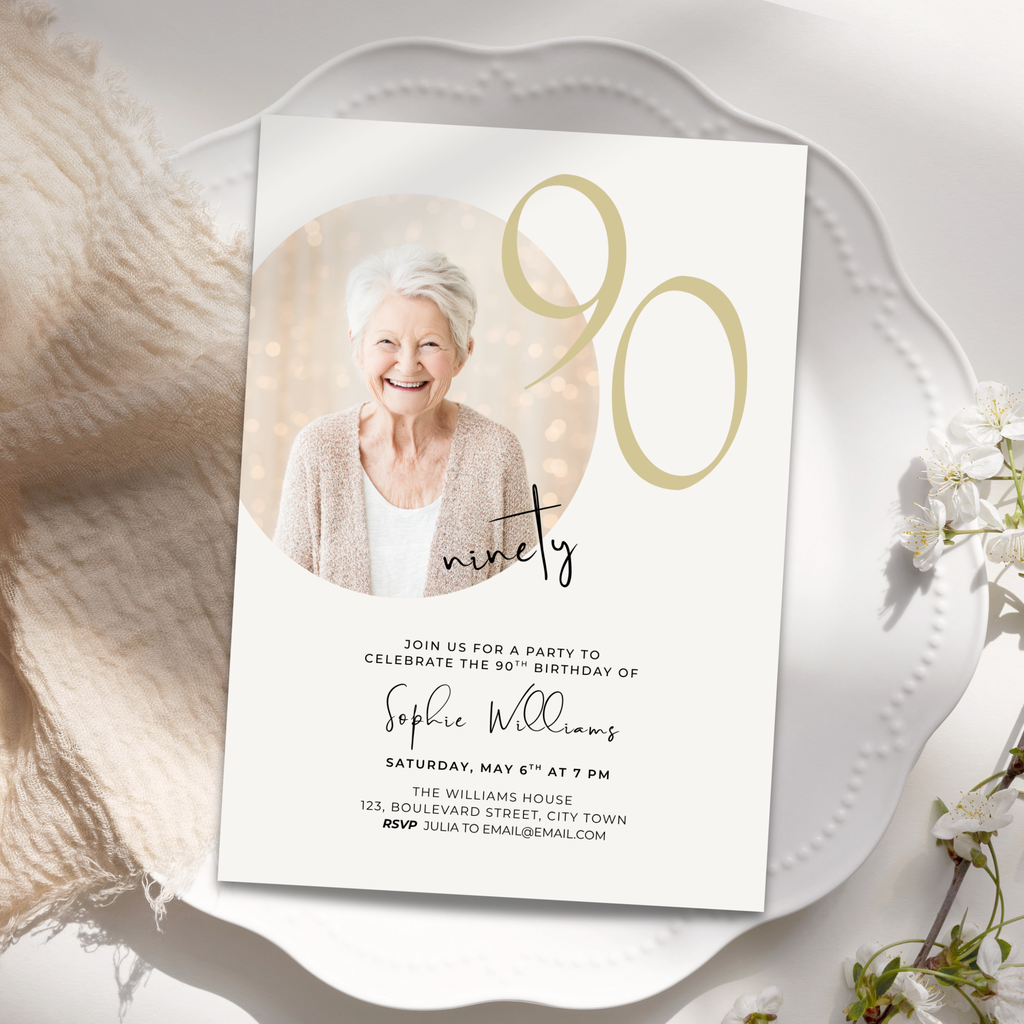 90th birthday invitation card with a photo of an elderly woman on a decorative white plate.