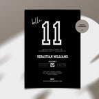 Black 11th birthday invitation card with white text for Sebastian Williams' 11th birthday on a light gray background.