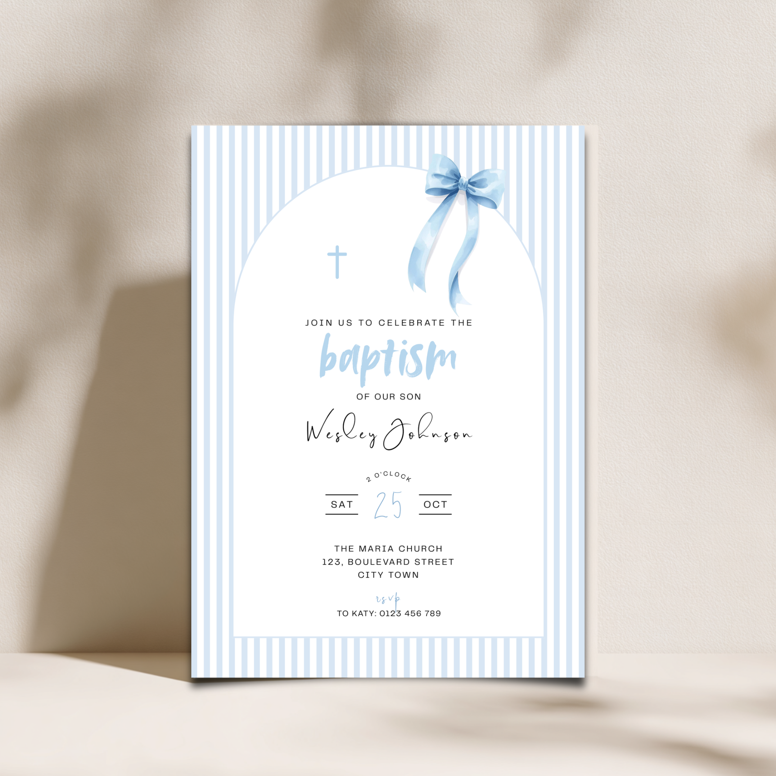 Baptism invitation card with blue ribbon and stripes on a beige background
