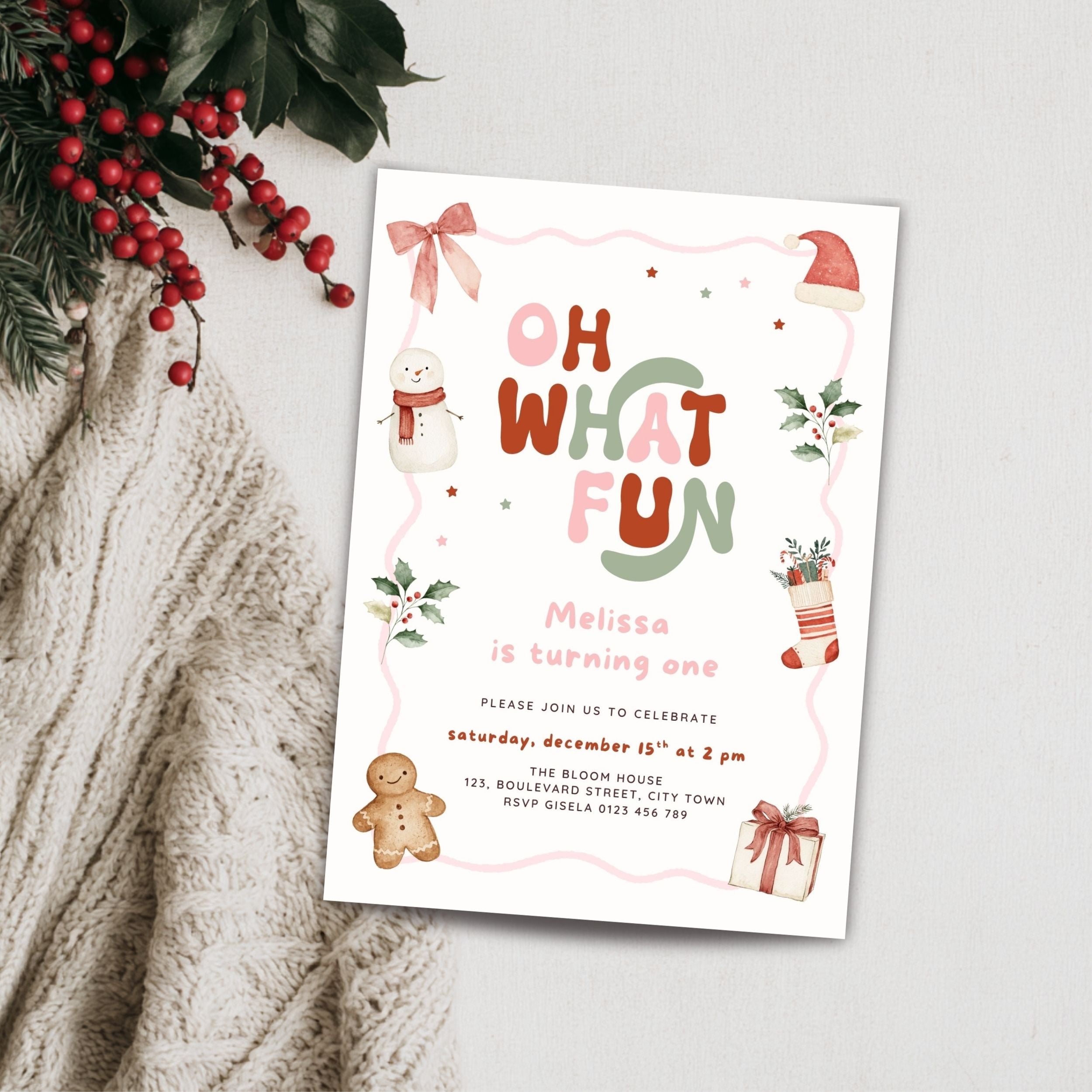 Christmas first birthday invitation for a girl featuring Oh What Fun lettering, watercolor snowman, gingerbread cookie, Santa hat, holly leaves, Christmas stocking, presents, pink bow, and festive holiday details. Digital download.