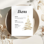 Golden tree christmas menu on a plate.