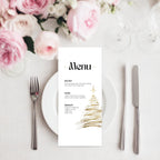 Menu card on a table setting with pink flowers and silverware