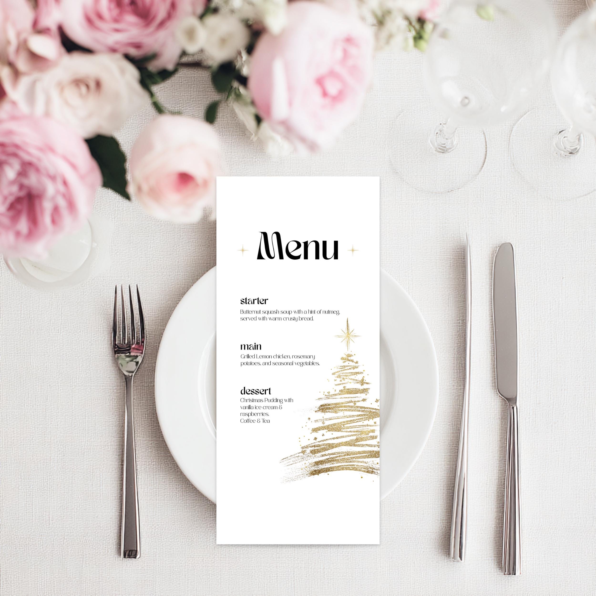 Menu card on a table setting with pink flowers and silverware