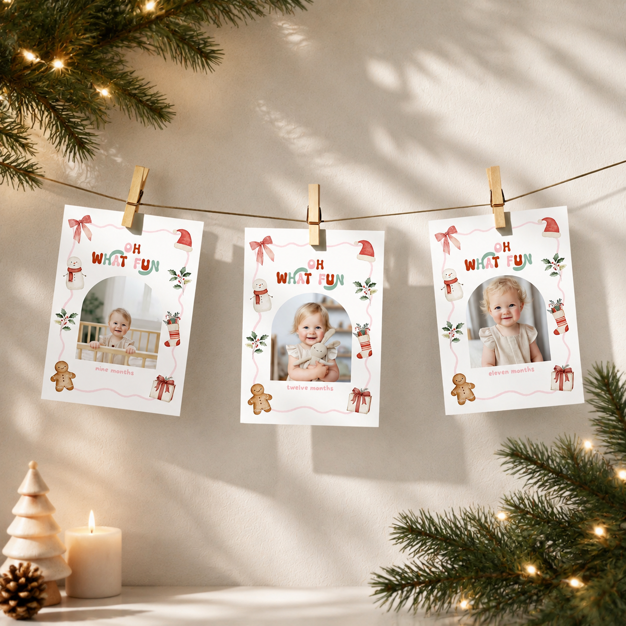 Christmas monthly photo banner featuring a baby photo in an arched frame, with a watercolor snowman, gingerbread cookie, Christmas stocking, Santa hat, holly, presents, and pink decorative border.