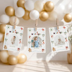 Three printed baby milestone photos clipped to a string banner with wooden clothespins, shown in a softly lit nursery-like setting with gold and white balloons in the background.