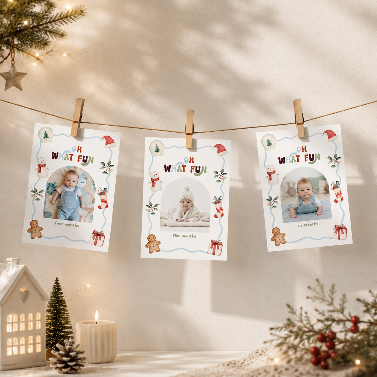 Christmas monthly photo banner featuring a baby photo in an arched frame, with a watercolor snowman, gingerbread cookie, Christmas stocking, Santa hat, holly, presents, and blue decorative border.