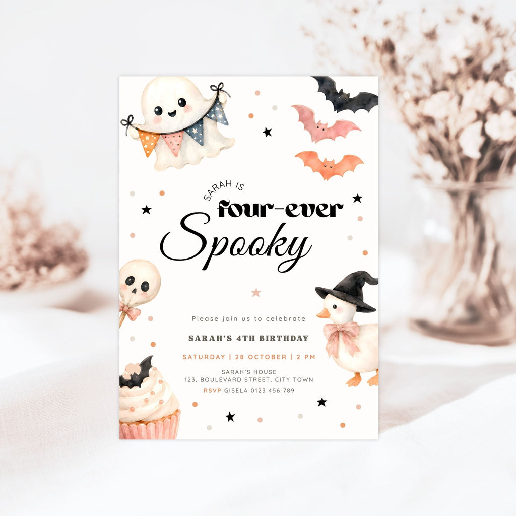A Halloween-themed birthday invitation card displayed on a light surface with soft blurred decorative flowers in the background. The card features cute illustrations of a ghost, bats, a pumpkin, a duck in a witch hat, a cupcake, and the text 'Sarah is four-ever Spooky' with event details.