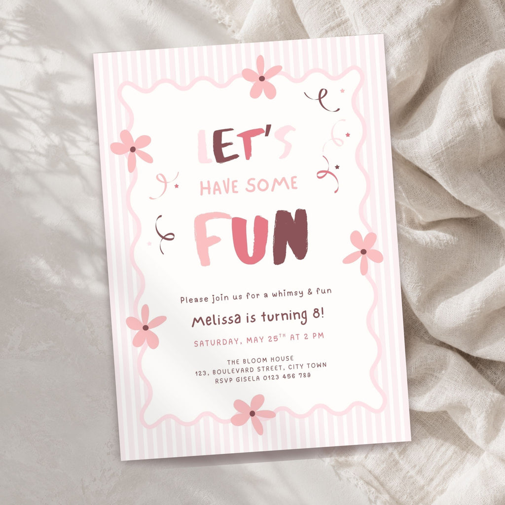 A pink and white striped birthday invitation card with floral illustrations and the text 'LET'S HAVE SOME FUN' and 'Melissa is turning 8!', photographed on a soft beige fabric background.
