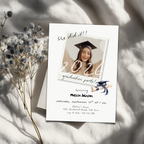 Graduation party invitation with photo of a graduate, text 'She did it!! 2026 graduation party' on a light background.