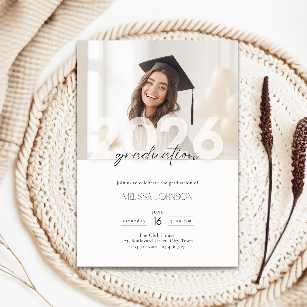Graduation invitation card with a photo of a graduate on a woven surface.
