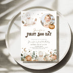 A square first birthday invitation card for 'Jennifer's First Boo Day' styled on a speckled white plate with soft shadows. The card features cute watercolor illustrations of white ghosts, pumpkins, stars, and a baby photo in the top right.