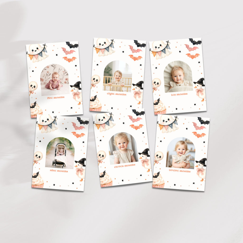 Six Halloween-themed baby milestone photo cards arranged on a light gray background. The cards feature a white background decorated with cute illustrations of bats, ghosts, witches, pumpkins, and spiderwebs, with individual baby photos and names printed on each card.