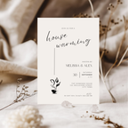 Housewarming invitation card with minimalistic design on a neutral background