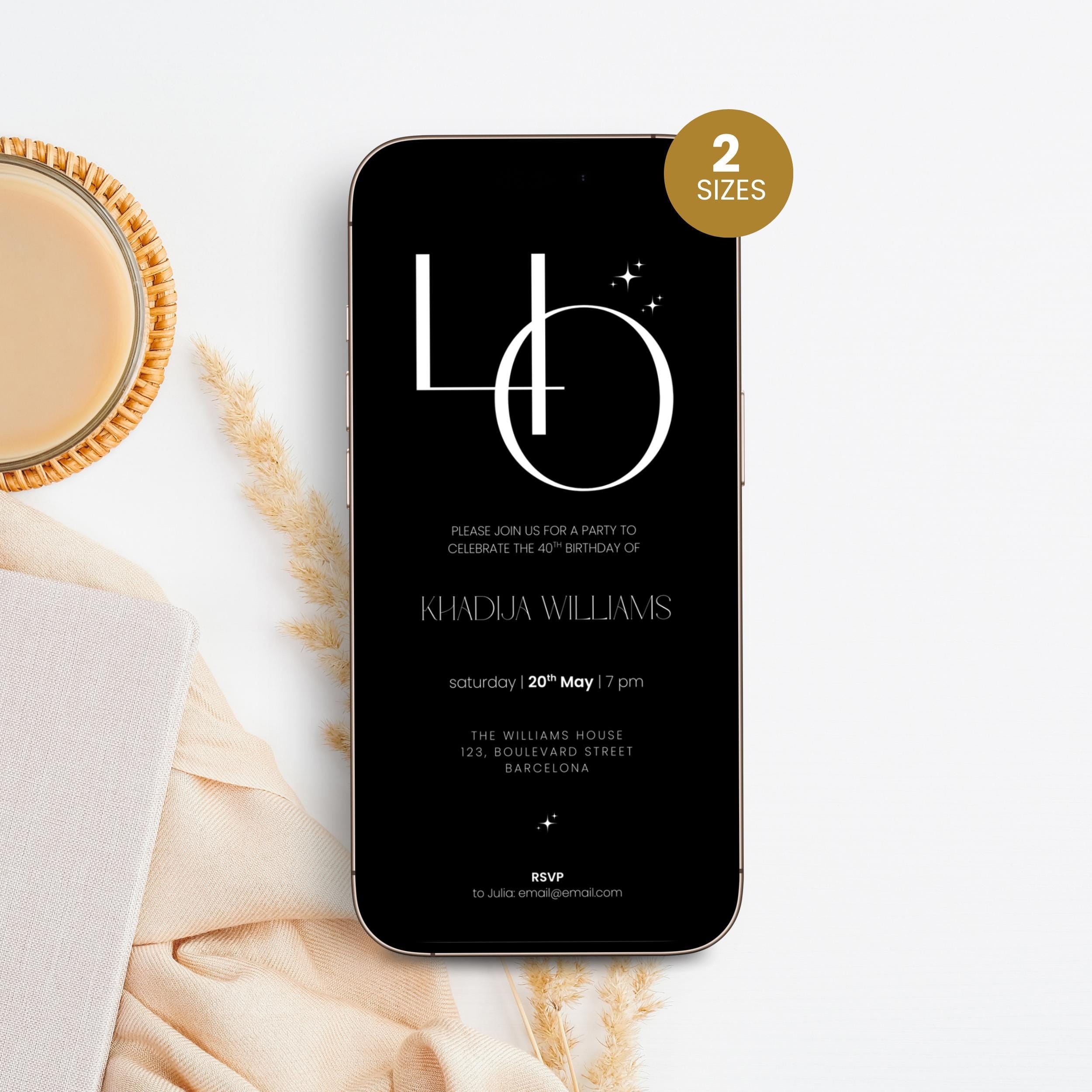 Phone displaying a 40th birthday invitation on a white surface with a cup of coffee and decorative elements.