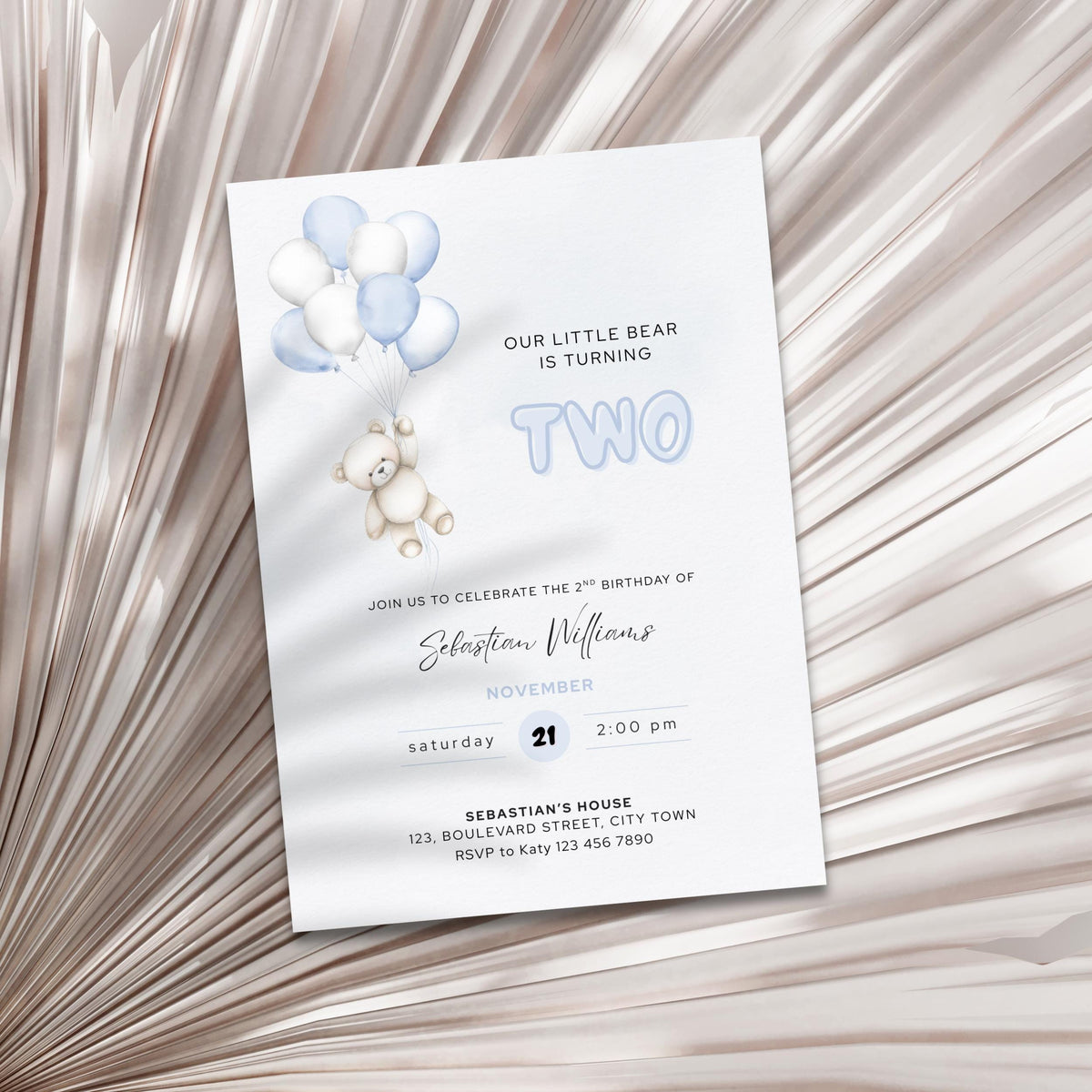 Close-up of bear and balloon design on 2nd birthday invitation