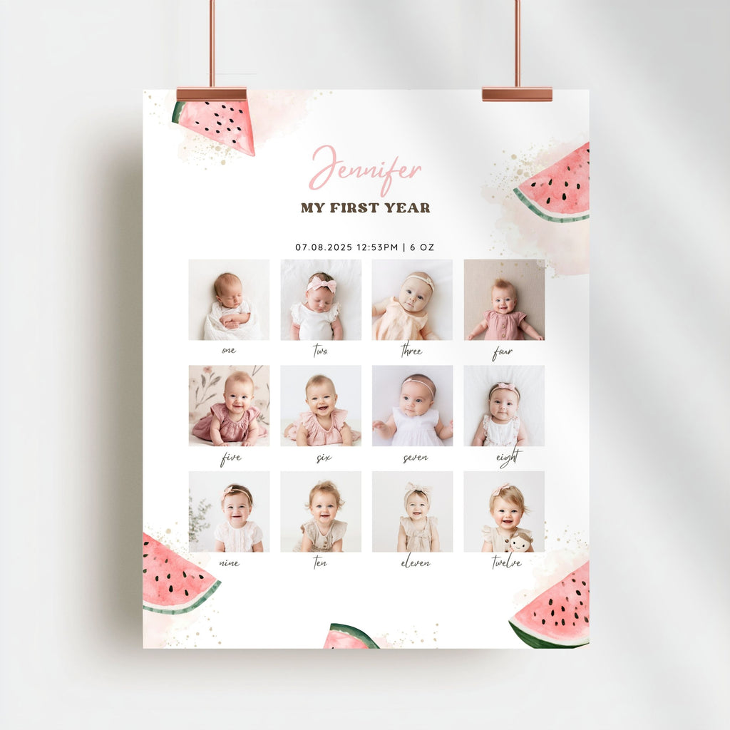 A personalized baby milestone poster hanging from two copper clips against a light gray wall. The white poster features watercolor pink watermelon graphics, the name 'Jennifer' in pink script, and the text 'MY FIRST YEAR' with birth details.