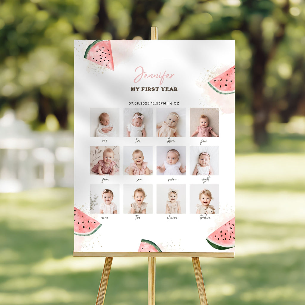 A personalized first-year baby milestone photo board displayed on a wooden easel outdoors. The white board features pink script text reading 'Jennifer MY FIRST YEAR' with dates and a grid of twelve baby photos, decorated with watermelon illustrations in the corners.