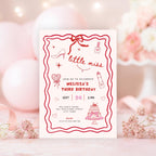 Birthday invitation card with red border and pink decorations on a blurred background