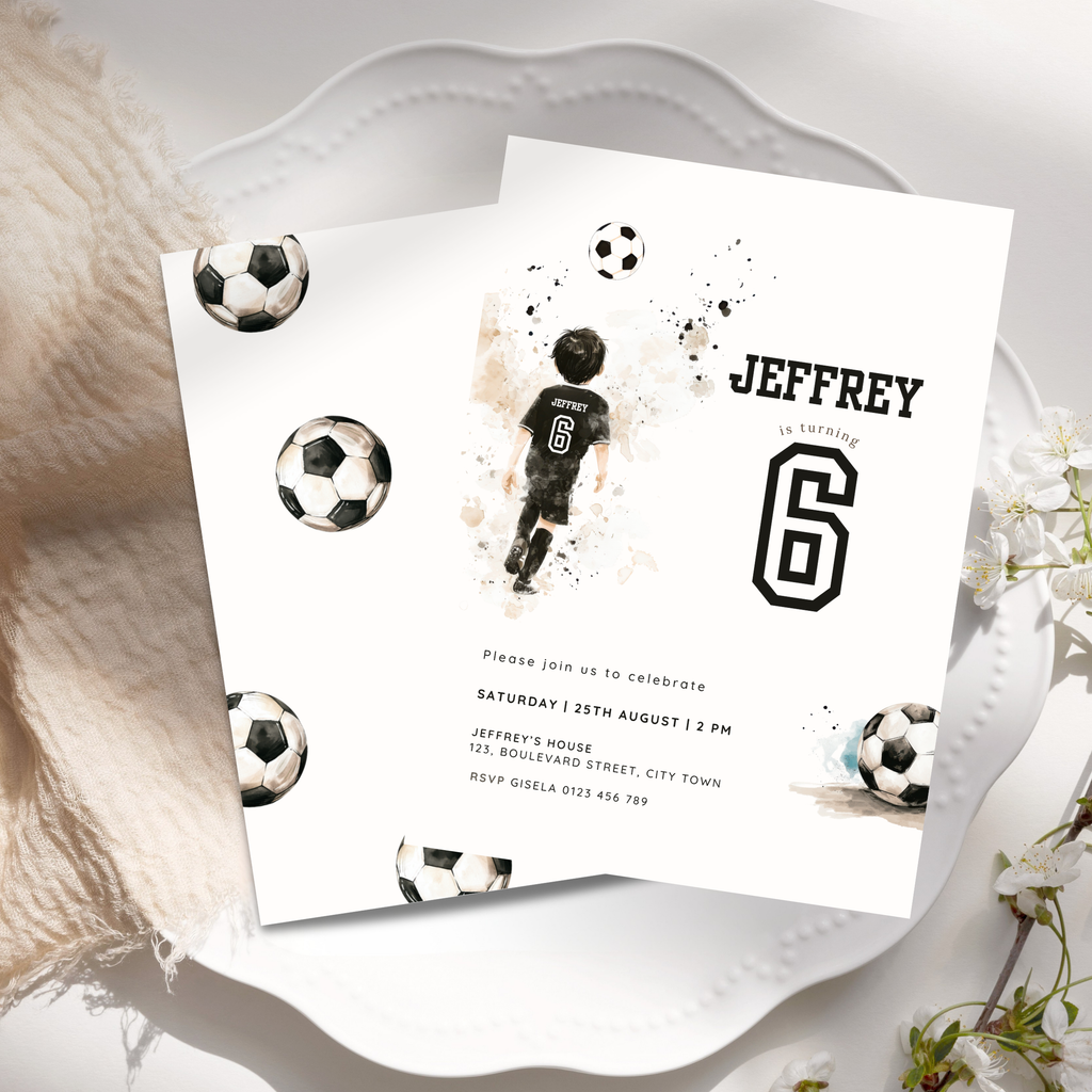 A soccer-themed 6th birthday invitation card for 'Jeffrey' with the number 6, styled on a white ceramic plate with a beige textured blanket and small white flowers.
