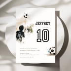 A soccer-themed 10th birthday invitation card for a 10-year-old boy named Jeffrey, styled on a white plate with soft shadows. The card features a watercolor soccer player, two soccer balls, and bold black text.
