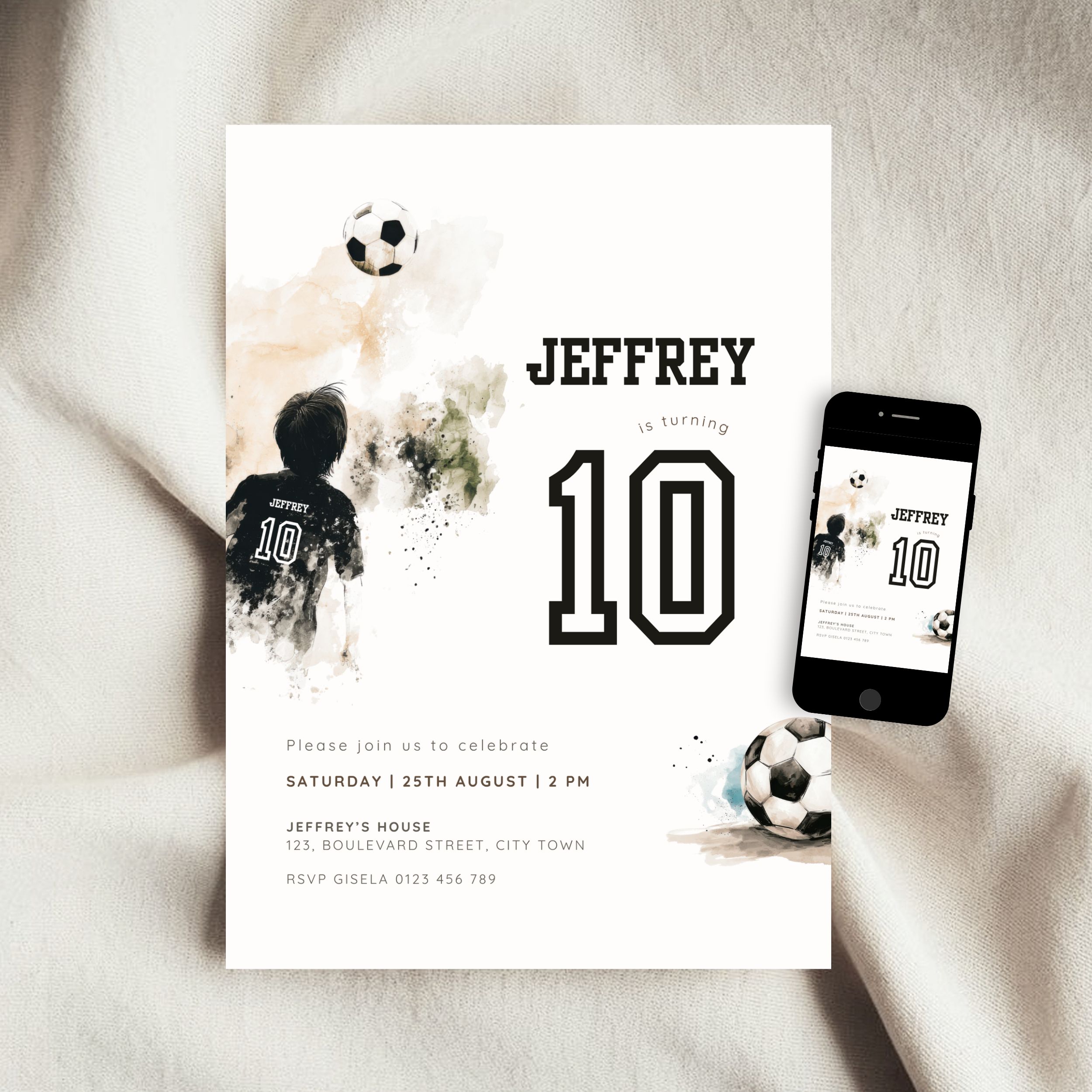 A soccer-themed 10th birthday invitation card for 'Jeffrey' is displayed on a soft beige fabric background next to a smartphone showing the digital design preview. The card features a white base with black text, a watercolor soccer player silhouette, and soccer ball illustrations.