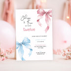 12th birthday Invitation card with pink and blue ribbons on a blurred background