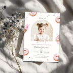 2nd birthday Invitation card with a photo of a young girl, donuts, and cupcakes on a light background.