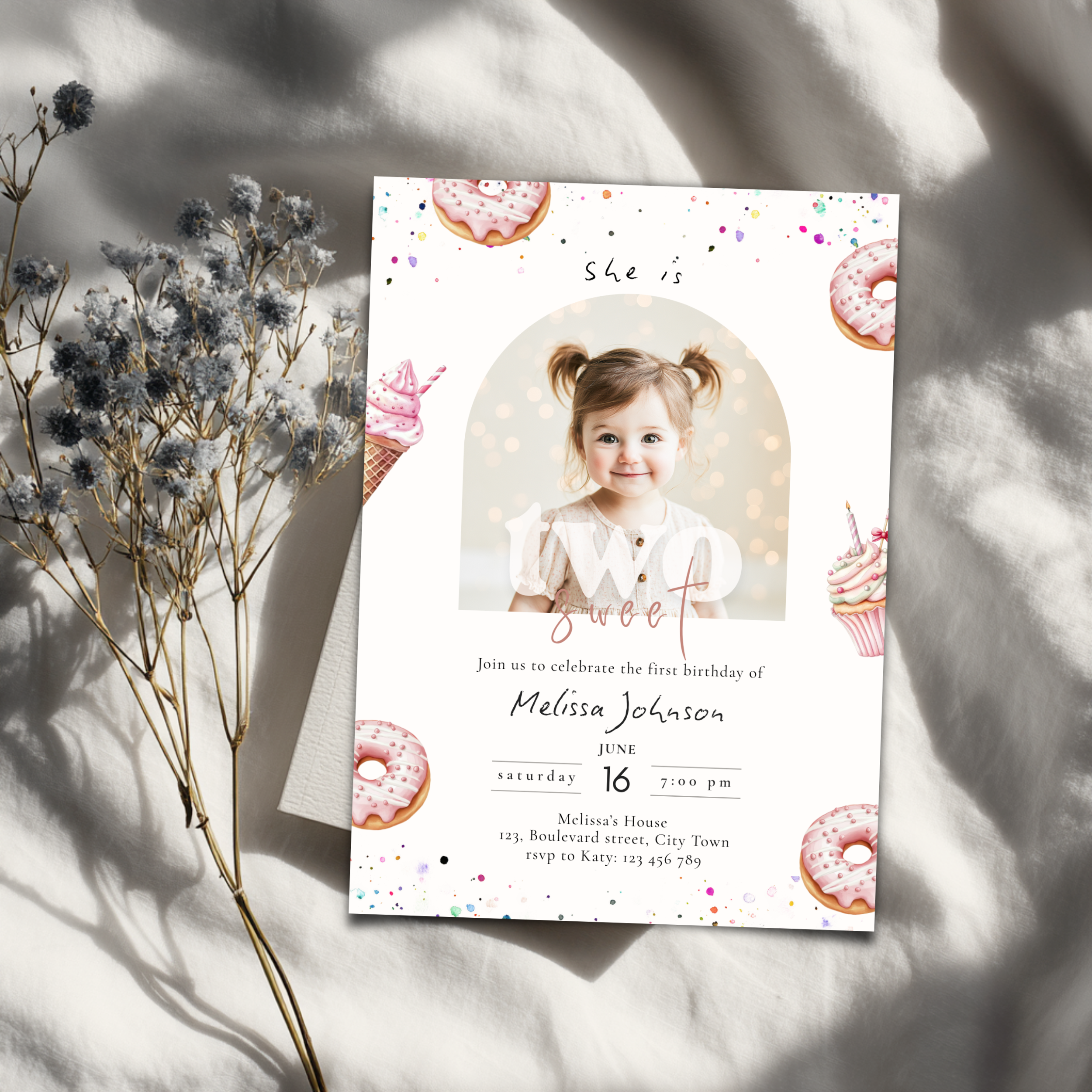2nd birthday Invitation card with a photo of a young girl, donuts, and cupcakes on a light background.